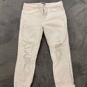 High waisted white ripped jeans